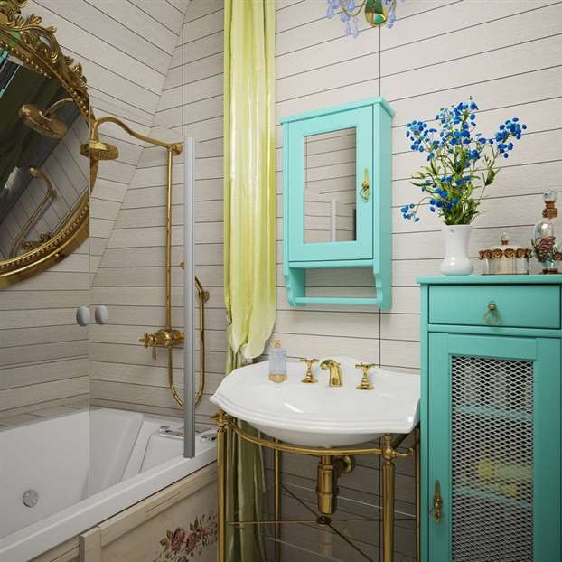 Уютная ванна с мебелью цвета мяты.
